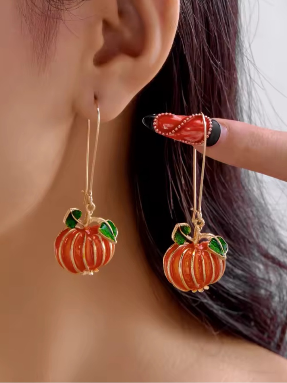 Gold-Tone Pumpkin Drop Earrings in Orange with Green Enamel Leaves